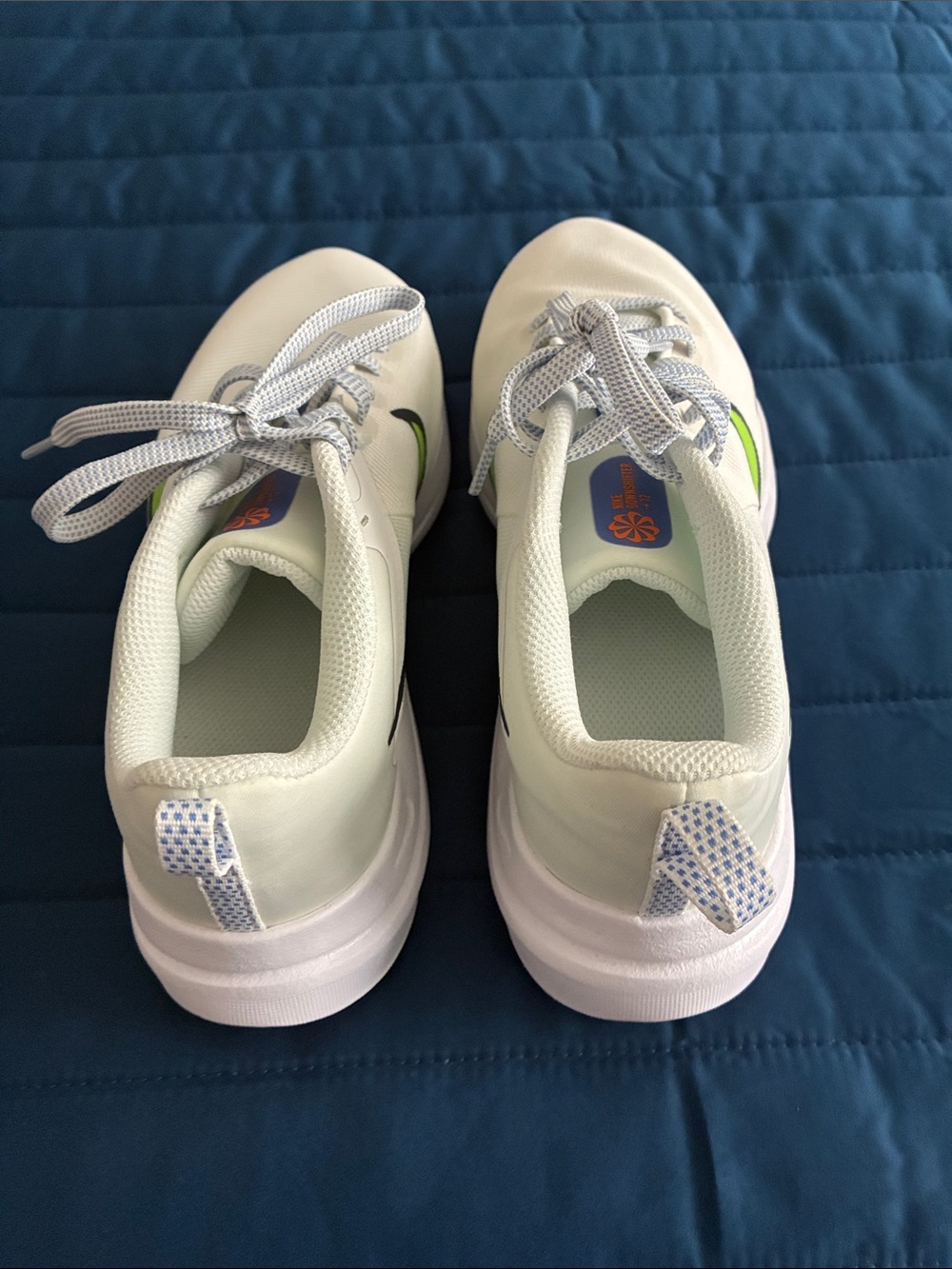 Women’s Nike Running Sneaker with Green Accent. Brand new no box and never worn